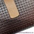 LARGE WOMEN'S WALLET IN BROWN UBRIQUE LEATHER BRAIDED WITH LEATHER CLOSURE